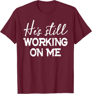 He's Still Working On Me Funny Christian Faith Based T-Shirt - T-Shirt | Maroon