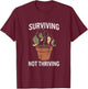 Surviving Not Thriving Adulting Mental Health Humor T-Shirt - T-Shirt | Maroon