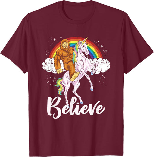 Bigfoot Riding Unicorn Believe Yeti Sasquatch Rainbow T-Shirt - T-Shirt | Maroon