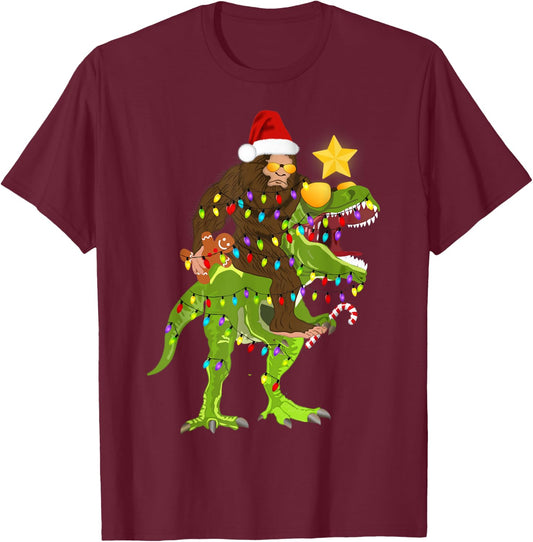 Xmas Tree Rex Yeti Bigfoot Sasquatch Riding Dinosaur T Rex T-Shirt - T-Shirt | Maroon