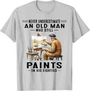 Never Underestimate an Old Man Who Still Paints T-Shirt - T-Shirt | Ash