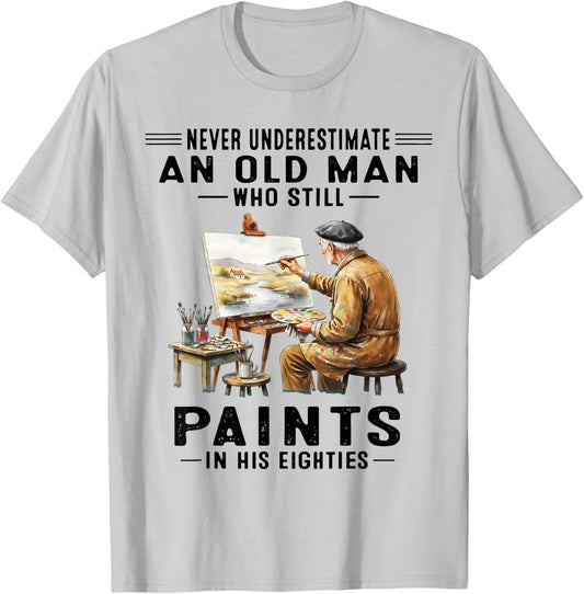 Never Underestimate an Old Man Who Still Paints T-Shirt - T-Shirt | Ash
