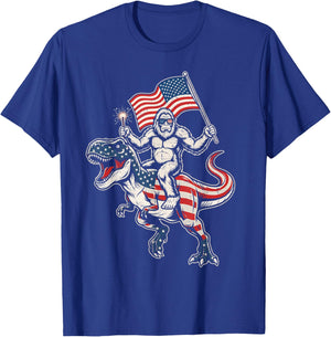4th of July Patriotic Bigfoot Sasquatch Riding T-Rex T-Shirt - T-Shirt | Royal